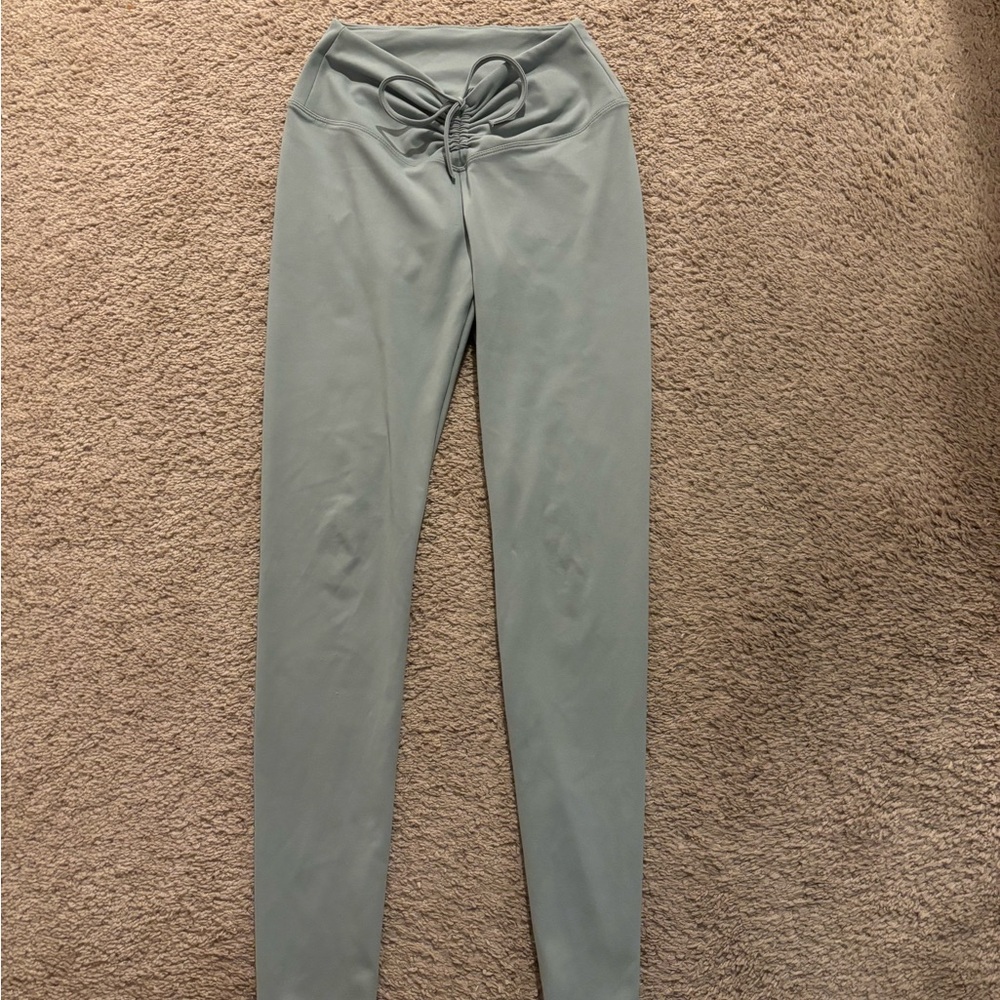 Green leggings